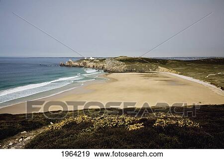 a beach and a lookout from world war two along the coast at pointe du toulinguet; britanny, france View Large Photo Image Stock Photo - a beach and a lookout from world war two along the coast at pointe du toulinguet; britanny, france. Fotosearch