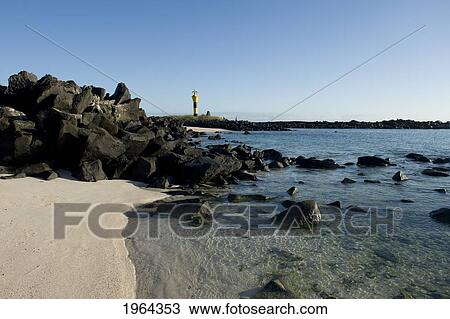 a beacon, rocks and white sand on the coast; galapagos, equador View Large Photo Image Stock Image - a beacon, rocks and white sand on the coast; galapagos, equador. Fotosearch