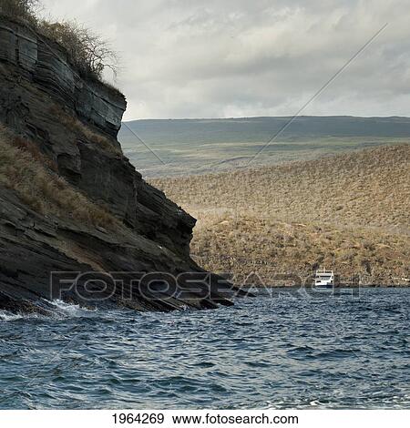 a boat in tagus cove off isabela island; galapagos, equador View Large Photo Image Stock Photo - a boat in tagus cove off isabela island; galapagos, equador. Fotosearch
