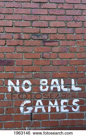 a brick wall with the message written saying no ball games; craster, northumberland, england View Large Photo Image Stock Photograph - a brick wall with the message written saying no ball games; craster, northumberland, england. Fotosearch