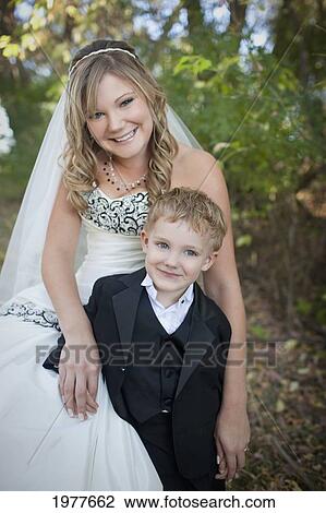 a bride with a young boy; edmonton alberta canada View Large Photo Image Stock Image - a bride with a young boy; edmonton alberta canada. Fotosearch