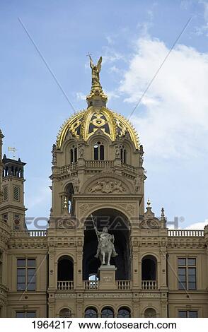a dome on the schwerin castle with a statue of a golden duke; schwerin, mecklenburg, germany View Large Photo Image Stock Photo - a dome on the schwerin castle with a statue of a golden duke; schwerin, mecklenburg, germany. Fotosearch