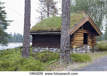 a log cabin on the water's edge of breidfla lake; kristiansand, norway View Large Photo Image Stock Photo - a log cabin on the water's edge of breidfla lake; kristiansand, norway. Fotosearch