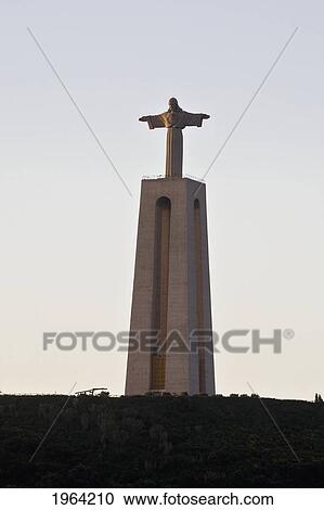 Stock Image - a monument of christ on a hill top; almada, lisbon, portugal. Fotosearch