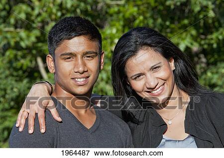 a mother and son spending quality time together in a park; edmonton, alberta, canada View Large Photo Image Stock Photo - a mother and son spending quality time together in a park; edmonton, alberta, canada. Fotosearch