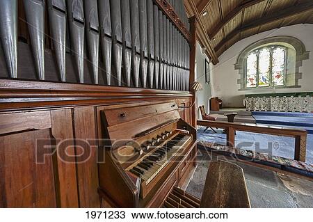 Stock Image - a pipe organ in a church; northumberland england. Fotosearch