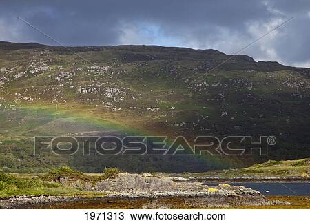 a rainbow reflected on a hill; highlands scotland View Large Photo Image Stock Image - a rainbow reflected on a hill; highlands scotland. Fotosearch