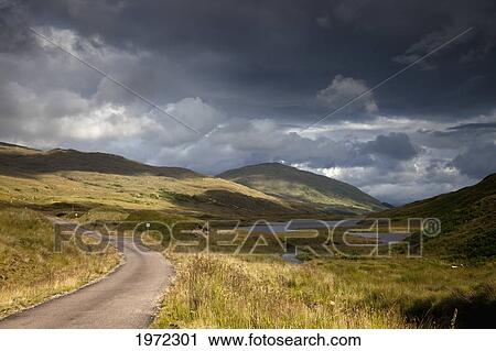 a road curving through a mountainous landscape; arnamurchan argyl scotland View Large Photo Image Stock Image - a road curving through a mountainous landscape; arnamurchan argyl scotland. Fotosearch