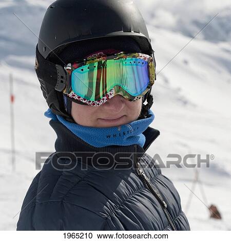 a skier in goggles and helmet at a ski resort; whistler british columbia canada View Large Photo Image Stock Image - a skier in goggles and helmet at a ski resort; whistler british columbia canada. Fotosearch