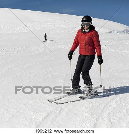 a skier making their way down a hill; whistler british columbia canada View Large Photo Image Stock Image - a skier making their way down a hill; whistler british columbia canada. Fotosearch