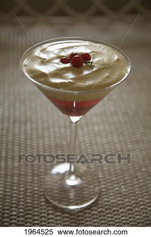a special drink served in glass stemware View Large Photo Image Stock Photography - a special drink served in glass stemware. Fotosearch