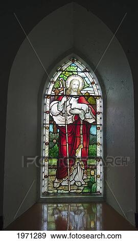 a stained glass window depicting jesus holding a sheep at church on the beach; ardnamurchan argyl scotland View Large Photo Image Stock Photo - a stained glass window depicting jesus holding a sheep at church on the beach; ardnamurchan argyl scotland. Fotosearch
