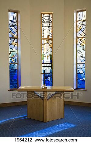 a table with a cross and communion emblems and stained glass windows inside a church; dore, sheffield, england View Large Photo Image Stock Image - a table with a cross and communion emblems and stained glass windows inside a church; dore, sheffield, england. Fotosearch