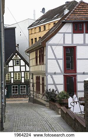 a traditional house with red trim; schwerin, mecklenburg, germany View Large Photo Image Picture - a traditional house with red trim; schwerin, mecklenburg, germany. Fotosearch
