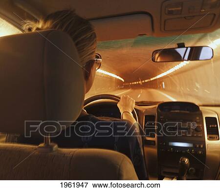 a woman driving through a tunnel near marbella; malaga province, costa del sol, andalusia, spain View Large Photo Image Stock Photo - a woman driving through a tunnel near marbella; malaga province, costa del sol, andalusia, spain. Fotosearch