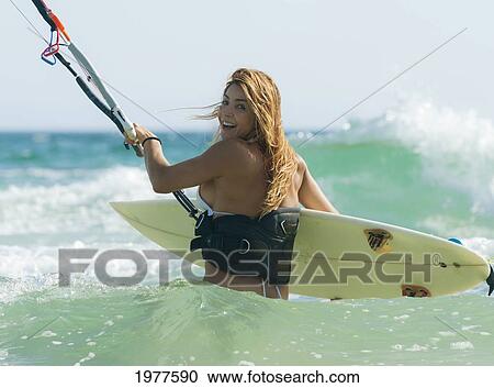 a woman kitesurfing; tarifa cadiz andalusia spain View Large Photo Image Stock Image - a woman kitesurfing; tarifa cadiz andalusia spain. Fotosearch