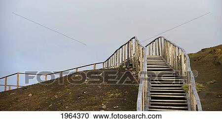 a wooden staircase going up a dirt hill; bartolone island, galapagos, equador View Large Photo Image Stock Image - a wooden staircase going up a dirt hill; bartolone island, galapagos, equador. Fotosearch