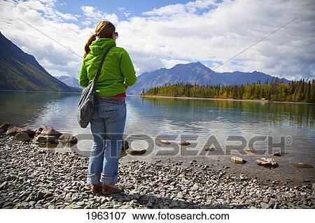 a young woman at kathleen lake; haines junction, yukon, canada View Large Photo Image Stock Photo - a young woman at kathleen lake; haines junction, yukon, canada. Fotosearch