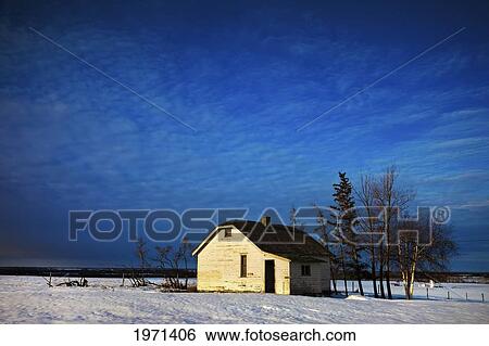 an abandoned homestead on a snow covered field; alberta canada View Large Photo Image Stock Photograph - an abandoned homestead on a snow covered field; alberta canada. Fotosearch