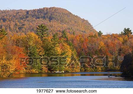 autumn colours along sallys pond; west bolton quebec canada View Large Photo Image Stock Photo - autumn colours along sallys pond; west bolton quebec canada. Fotosearch