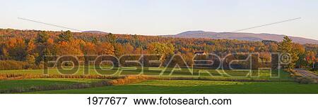 Stock Photo - autumn panorama in the late afternoon sun; foster quebec canada. Fotosearch