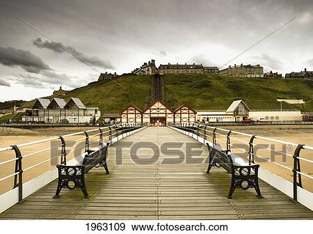 Stock Photo - benches along a pier; saltburn, cleveland, england. Fotosearch