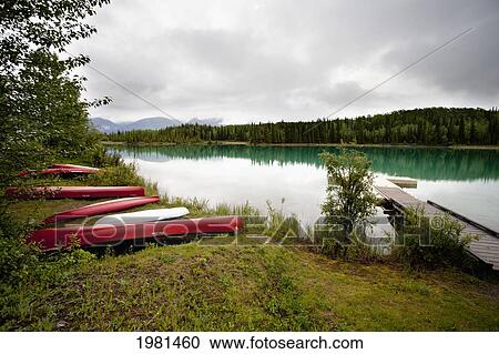 canoes on shore of boya lake; centreville british columbia canada View Large Photo Image Stock Image - canoes on shore of boya lake; centreville british columbia canada. Fotosearch