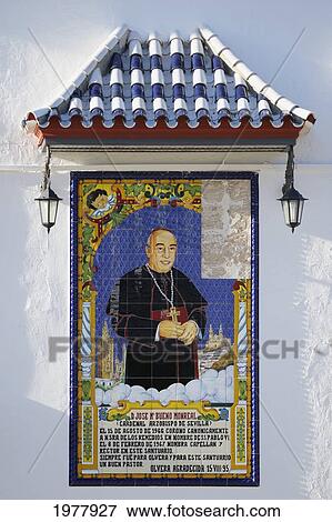 Stock Photo - ceramic tile plaque of the cardinal archbishop of seville on the facade of the santuario nuestra senora de los remedios; olvera cadiz andalusia spain. Fotosearch