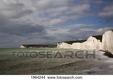 chalk headland cliffs along the coast; south downs, sussex, england View Large Photo Image Picture - chalk headland cliffs along the coast; south downs, sussex, england. Fotosearch