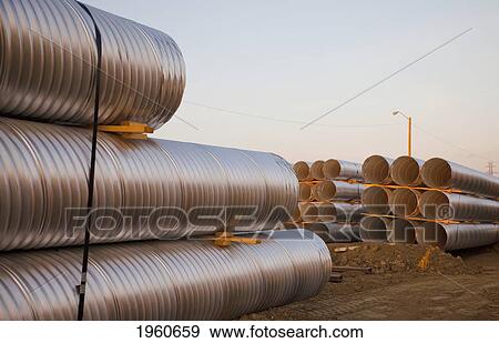 Stock Photo - culvert pipe used in road construction; edmonton, alberta, canada. Fotosearch