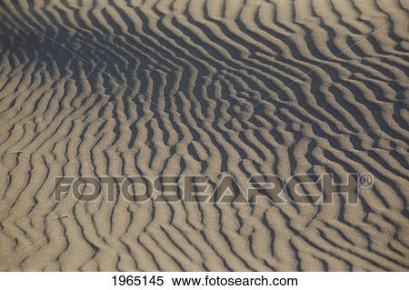 detail of sand ripples on a beach; newport oregon united states of america View Large Photo Image Stock Photography - detail of sand ripples on a beach; newport oregon united states of america. Fotosearch