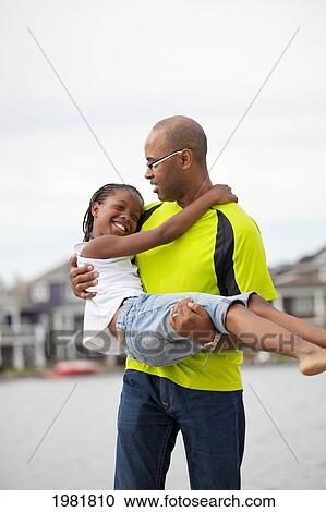 father and daughter having fun together outdoors; edmonton alberta canada View Large Photo Image Stock Image - father and daughter having fun together outdoors; edmonton alberta canada. Fotosearch