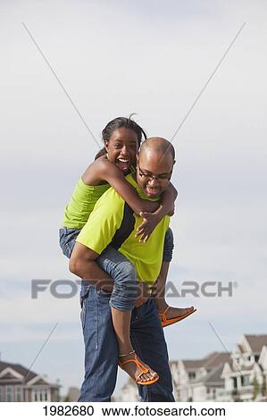 father and daughter having fun together outdoors; edmonton alberta canada View Large Photo Image Stock Image - father and daughter having fun together outdoors; edmonton alberta canada. Fotosearch