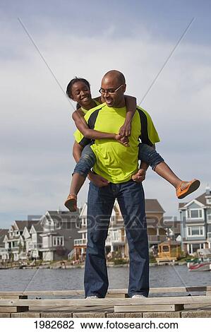 father and daughter having fun together outdoors; edmonton alberta canada View Large Photo Image Stock Image - father and daughter having fun together outdoors; edmonton alberta canada. Fotosearch