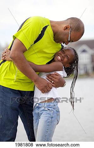 father and daughter having fun together outdoors; edmonton alberta canada View Large Photo Image Stock Photo - father and daughter having fun together outdoors; edmonton alberta canada. Fotosearch