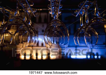 glasses hanging in a bar; kunming yunnan china View Large Photo Image Stock Photo - glasses hanging in a bar; kunming yunnan china. Fotosearch