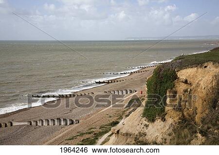groynes along the coastline; bexhill, sussex, england View Large Photo Image Stock Photograph - groynes along the coastline; bexhill, sussex, england. Fotosearch