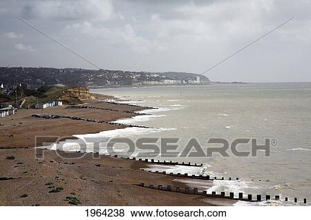 groynes along the coastline; hastings, sussex, england View Large Photo Image Stock Photo - groynes along the coastline; hastings, sussex, england. Fotosearch