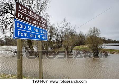 Stock Photo - high water levels in assiniboine river after flooding; st. francois xavier, manitoba, canada. Fotosearch