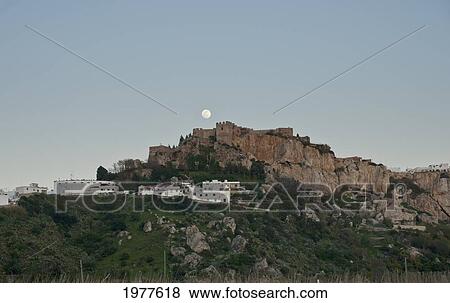 Stock Photo - moonrise over castillo salobrena; salobrena granada spain. Fotosearch