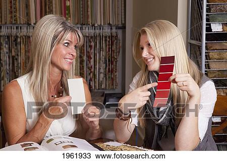 mother and daughter discussing colours and samples for remodelling of home; edmonton, alberta, canada View Large Photo Image Stock Image - mother and daughter discussing colours and samples for remodelling of home; edmonton, alberta, canada. Fotosearch
