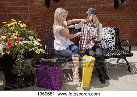 mother and daughter resting after shopping; edmonton, alberta, canada View Large Photo Image Stock Image - mother and daughter resting after shopping; edmonton, alberta, canada. Fotosearch
