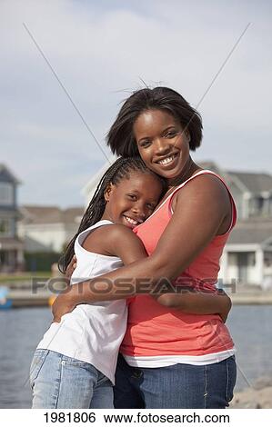 Stock Photograph - mother and daughter spending quality time together outdoors; edmonton alberta canda. Fotosearch