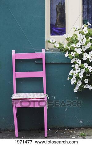 pink chair on the street outside bridge house bed and breakfast; skibbereen county cork ireland View Large Photo Image Stock Photo - pink chair on the street outside bridge house bed and breakfast; skibbereen county cork ireland. Fotosearch