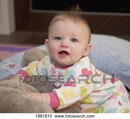 portrait of a baby girl; spruce grove alberta canada View Large Photo Image Stock Photography - portrait of a baby girl; spruce grove alberta canada. Fotosearch