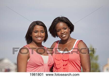 portrait of a mother and daughter outdoors; edmonton alberta canda View Large Photo Image Stock Image - portrait of a mother and daughter outdoors; edmonton alberta canda. Fotosearch