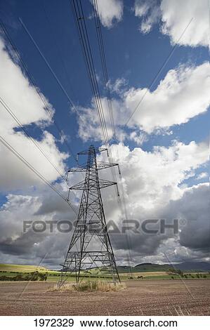 Stock Photo - power lines and a transmission tower; scottish borders scotland. Fotosearch