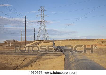 power transmission and sewer pipe along roadway development; edmonton, alberta, canada View Large Photo Image Stock Photograph - power transmission and sewer pipe along roadway development; edmonton, alberta, canada. Fotosearch