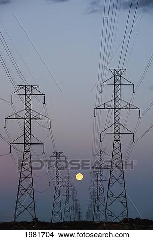 power transmission lines at dusk; beaumont alberta canada View Large Photo Image Picture - power transmission lines at dusk; beaumont alberta canada. Fotosearch