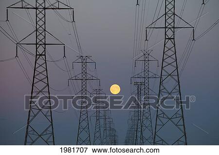 power transmission lines at dusk; beaumont alberta canada View Large Photo Image Stock Photo - power transmission lines at dusk; beaumont alberta canada. Fotosearch